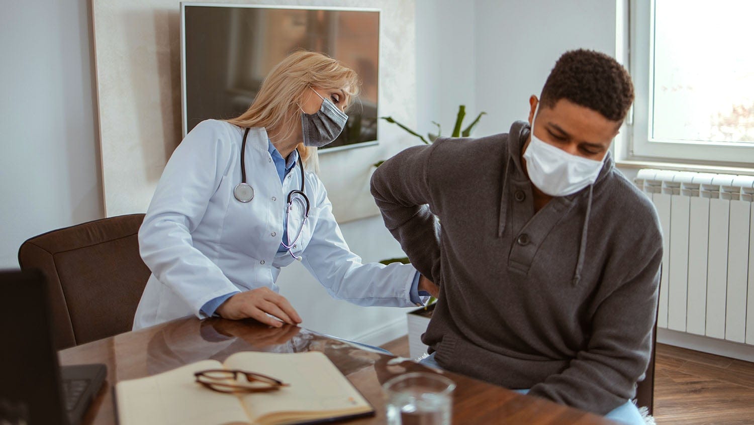 nephrology doctor with black patient