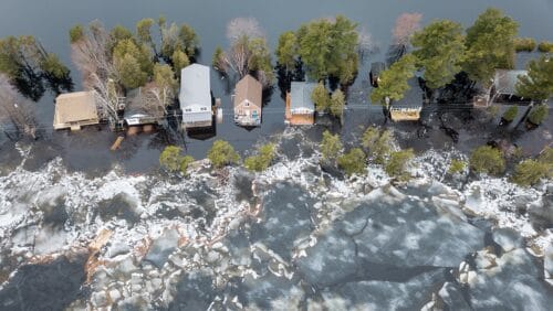 Aerial view of residential area flooded by storm waters.