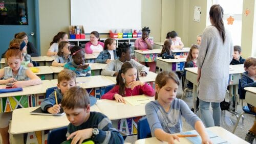 children in classroom after covid-19 pandemic