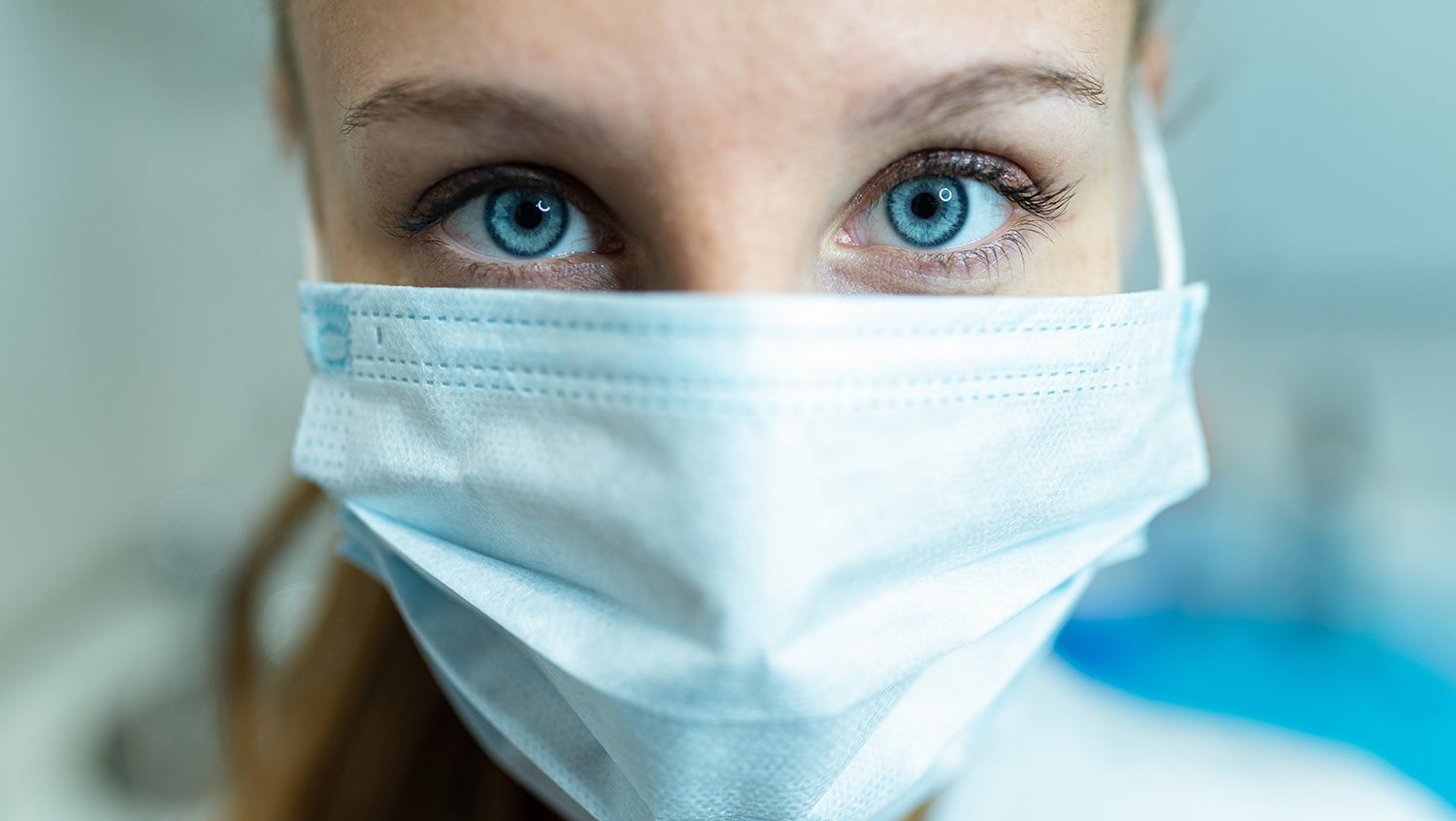 Close up of a nurse wearing a surgical mask