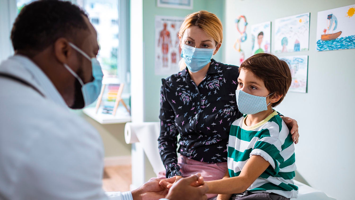 pediatrician explaining vaccine concerns to patient