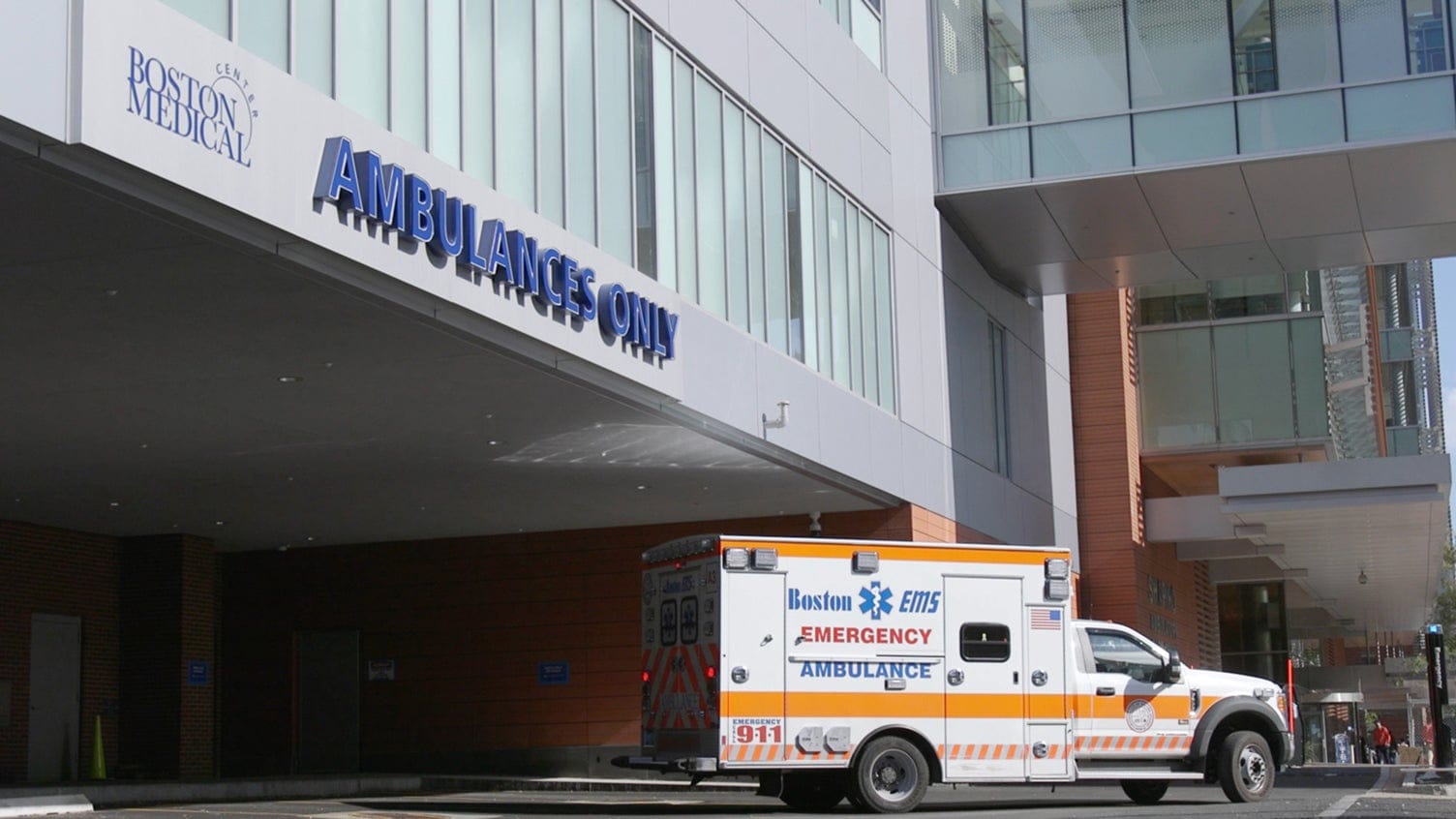ambulance with gun violence patient at hospital's emergency room drop-off