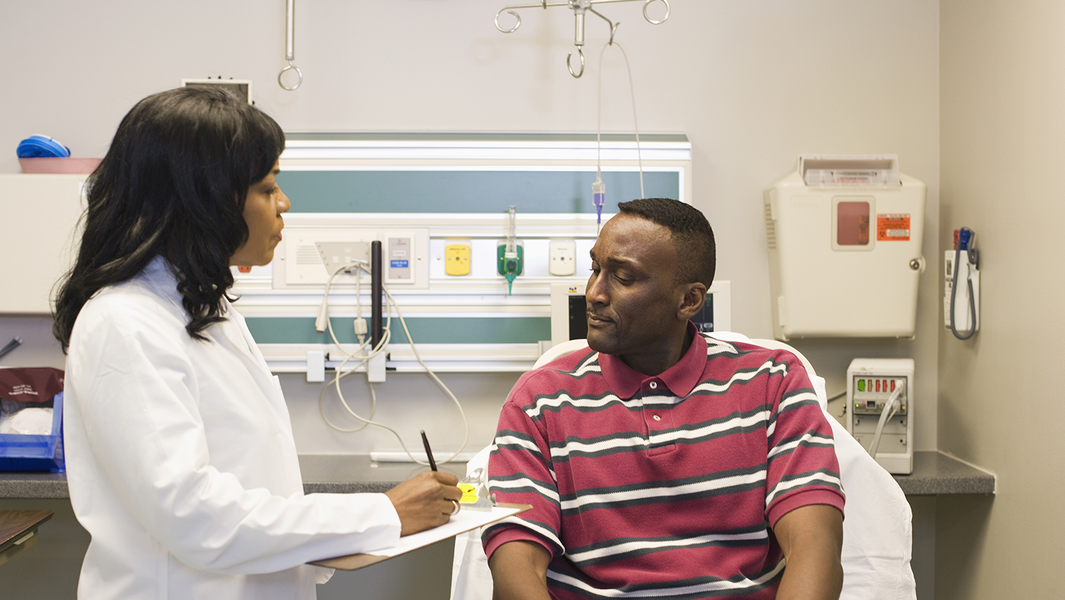 Doctor speaking with patient 