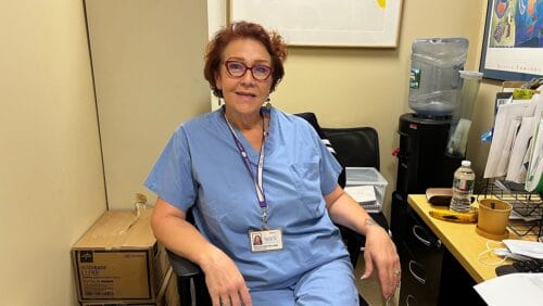 addiction recovery counselor rosa williams at her desk at boston medical center