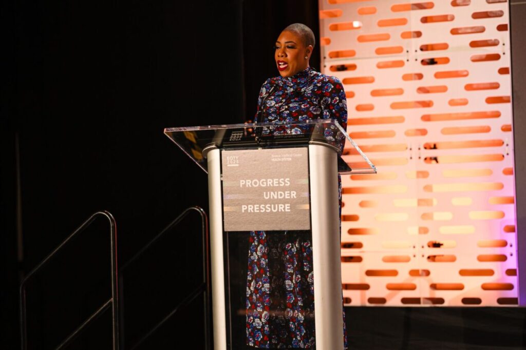 Symone Sanders Townsend addresses the crowd at EQTY 2025. Piper Brown Photography.