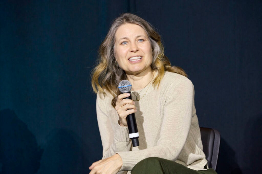 Jessie Gaeta, MD, of Boston Health Care for the Homeless Program, speaks on day one of Boston Medical Center’s annual Together for Hope conference during the plenary panel, “Rolling Toward Recovery: How Mobile Clinics Are Rewriting Access to Substance Use Disorder Care and Harm Reduction.” 