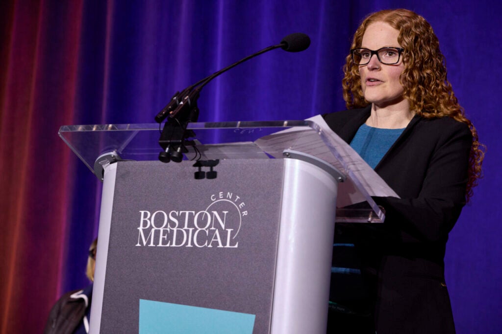 Desiree Millett, LICSW, administrative director of Recovery Services at NeighborHealth, speaks during the plenary talk, “Implementing Innovative Naloxone Distribution Strategies in Boston,” on day two of the annual Together for Hope conference. 