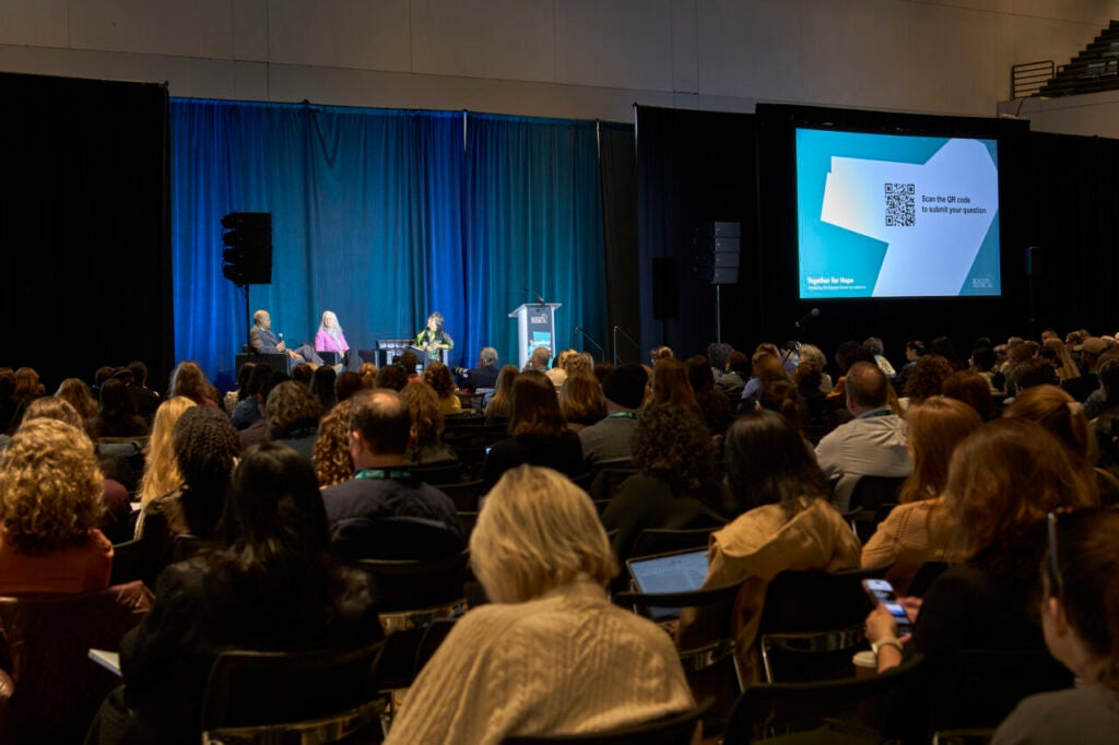 On day one of the annual Together for Hope conference, attendees gather for the opening fireside chat keynote.