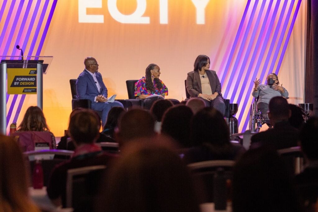 panelists speak on stage at the EQTY 2026 racial health equity summitt